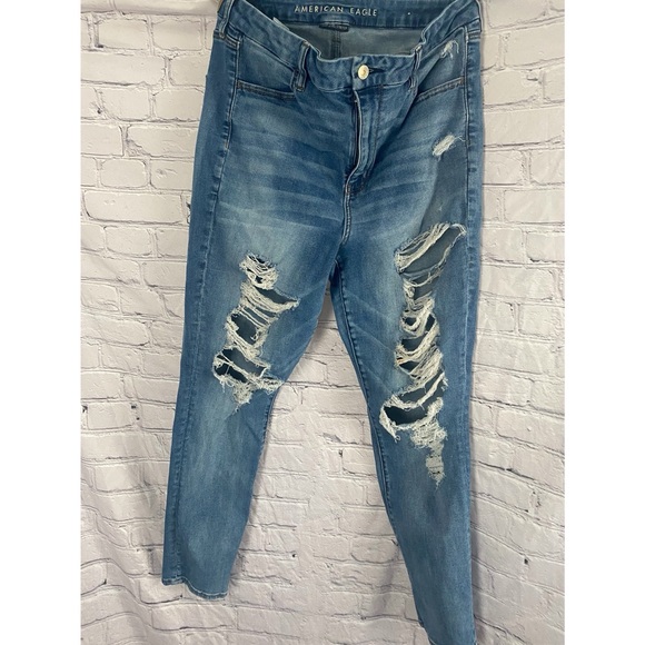 American Eagle Outfitters Denim - American Eagle Next Level Stretch Jeans with Distressed Holes
Size 16